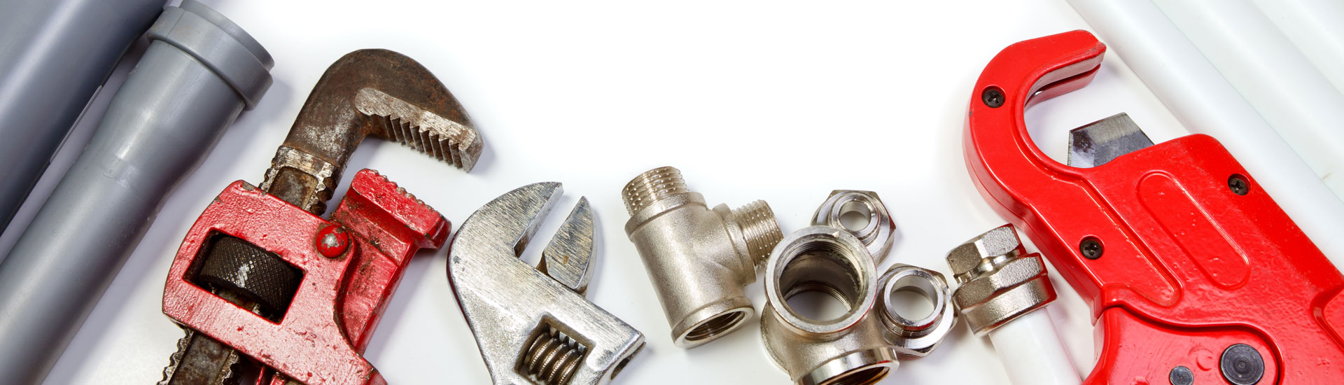 Plumbing Tool Pipes and Fittings on White Background